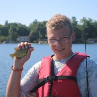 Child fishing at Pine Ridge