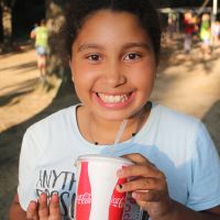 Child with snack at Pine Ridge